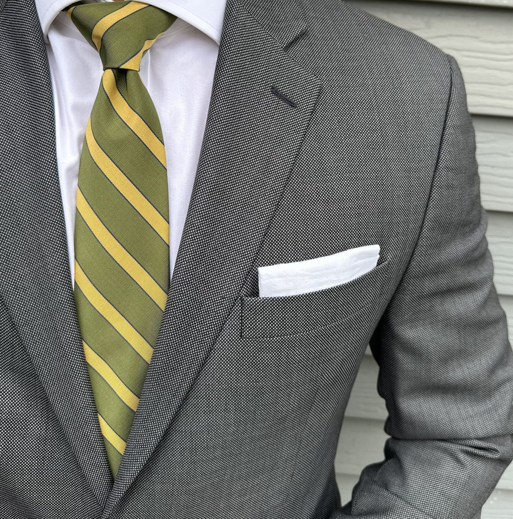 Olive green mogador striped necktie photographed flat on a light surface