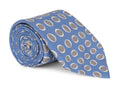 Blue silk necktie patterned with small repeating ovals, close detail