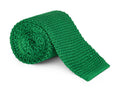 Emerald green knitted silk necktie with a squared tip, shown flat
