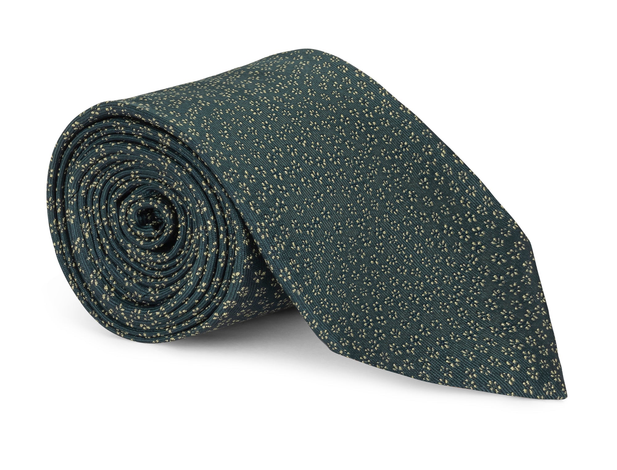 Green floral patterned silk necktie laid flat on a pale background