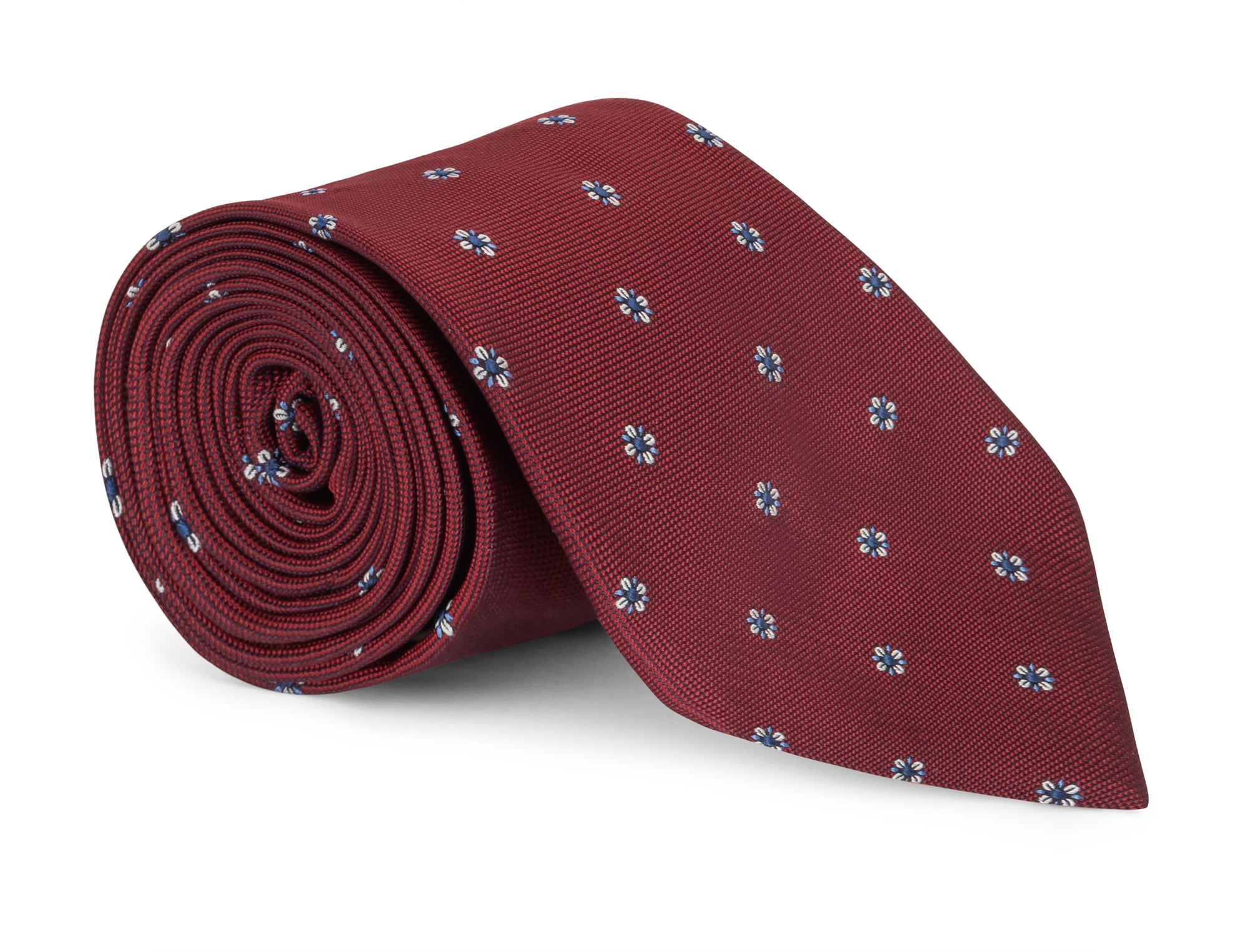 Red foulard silk necktie with a classic repeating pattern, shown flat